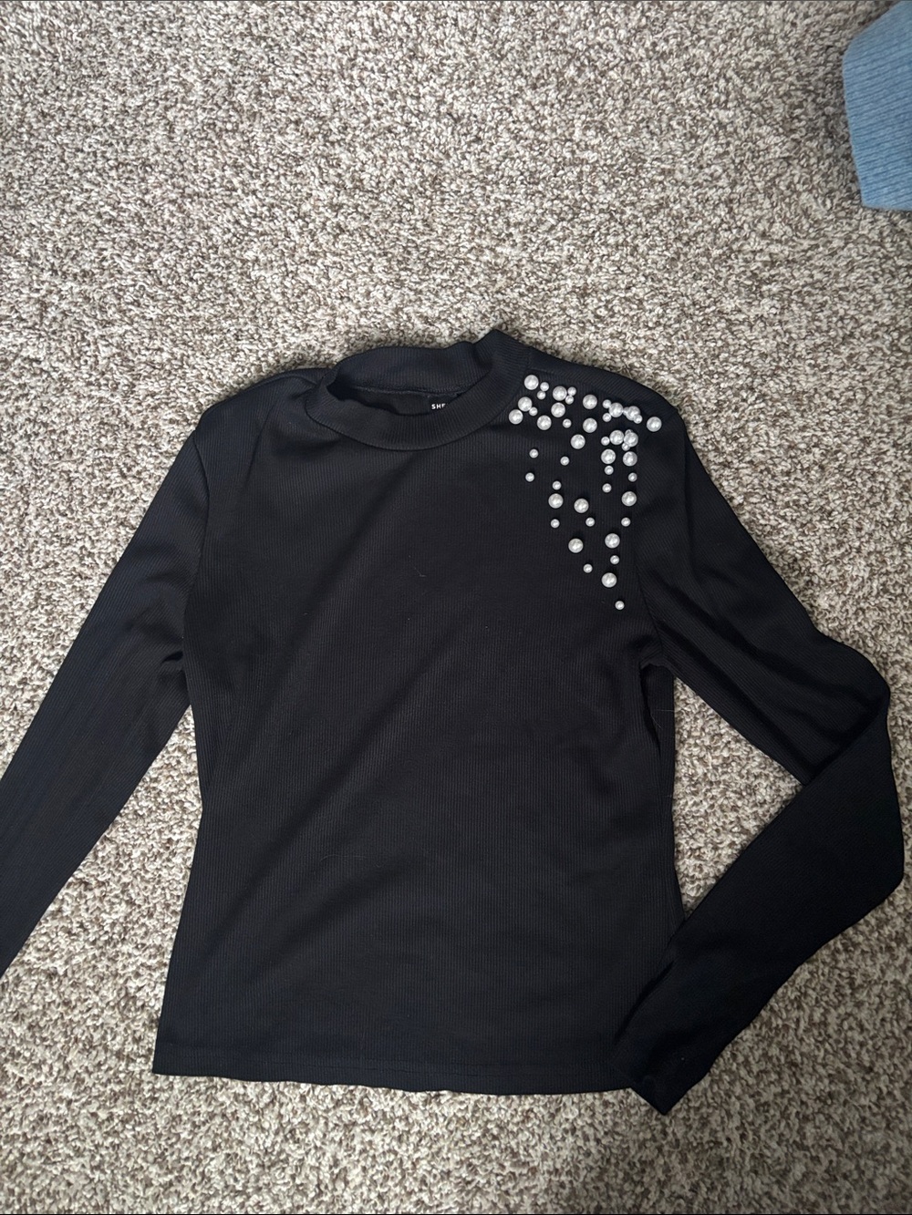 Black Long-Sleeve Top with Pearl Accent